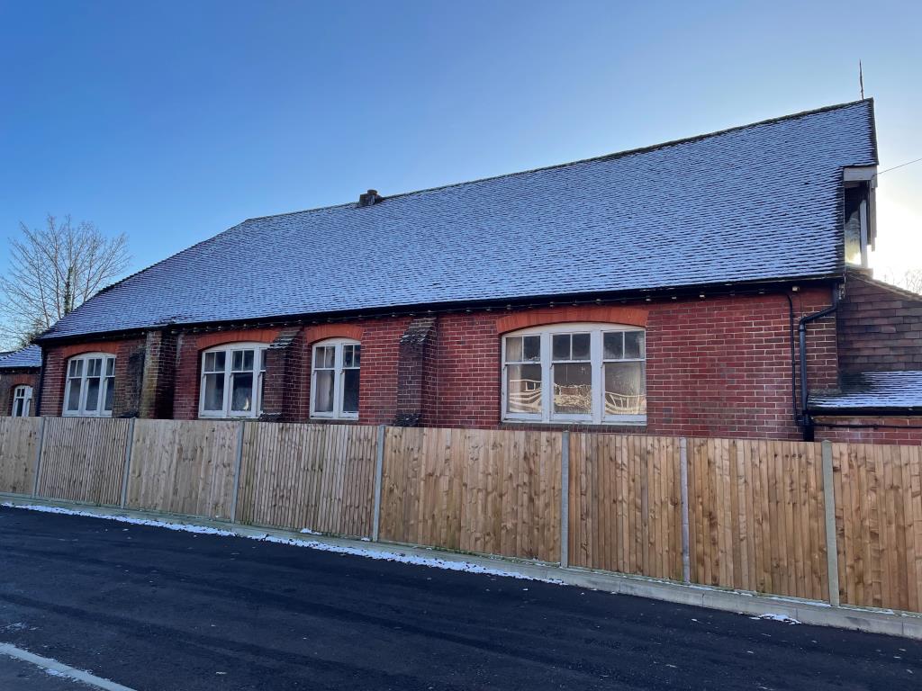 Lot: 134 - FORMER VILLAGE HALL WITH CONSENT FOR CONVERSION INTO SIX RESIDENTIAL DWELLINGS - Side view from Russell Place 1
